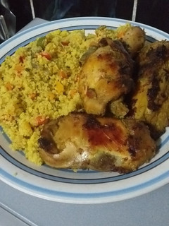 A picture of Stir fried couscous with roasted chicken.