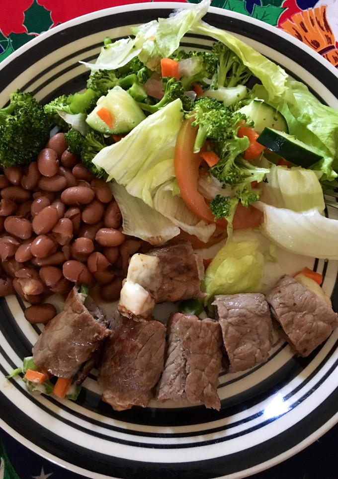 Una foto de Rollitos de bistec con pimiento, zanahoria y queso