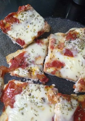 Una foto de Pizza de pollo