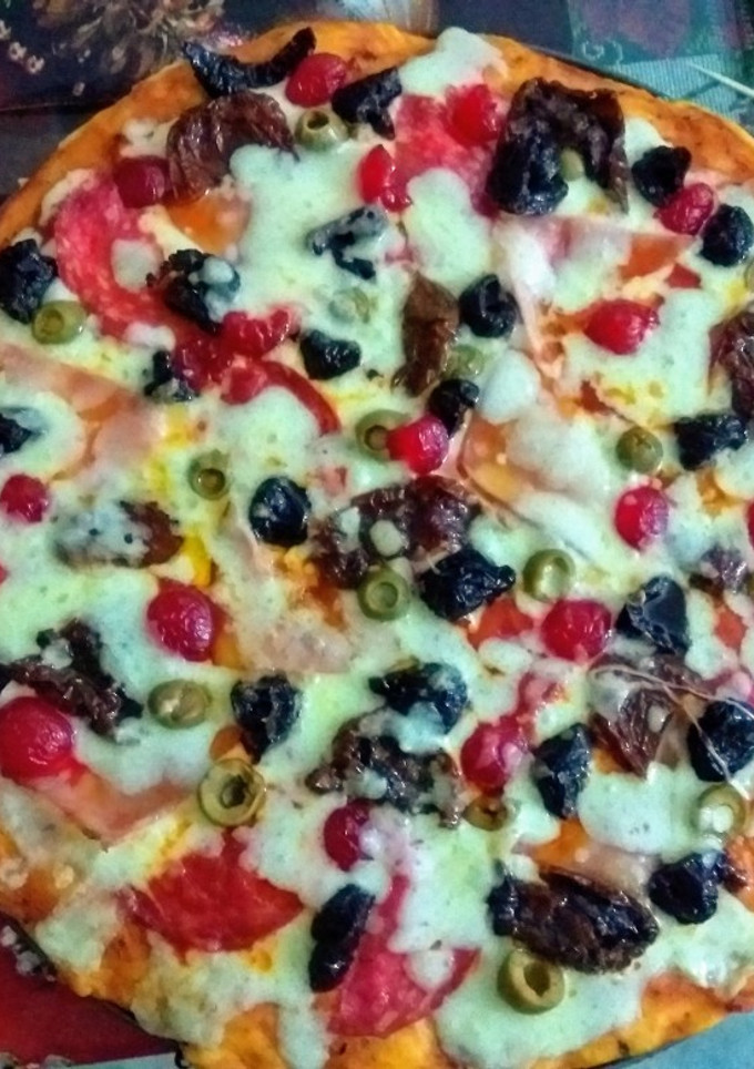 Una foto de Pizza de colores Navideña