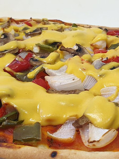 Una foto de Pizza Vegana