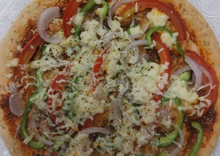Onion capcicum tomato pizza