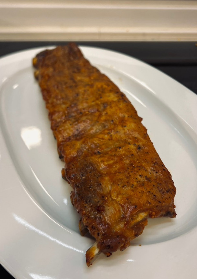 Una foto de Costillar de cerdo al horno