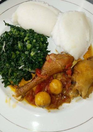 A picture of Stewed Kienyeji Chicken Ugali and Spinach.