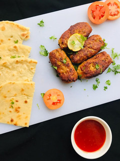 A picture of Turkish Adana Kebab With Bread.
