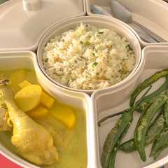 A picture of Opor ayam & nasi goreng margarin.