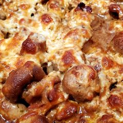 A picture of Cheese and Garlic Mushrooms with Bacon.