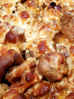 A picture of Cheese and Garlic Mushrooms with Bacon.