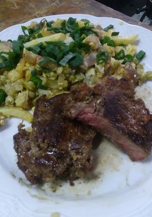 Una foto de Bife de chorizo con revuelto gramajo