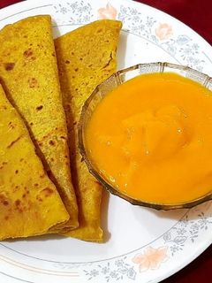 पुरणपोळी आणि आंब्याचा रस(puranpoli aani ambyacha rassa recipe in marathi) रेसिपी चे मुख्य फोटो