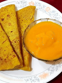 पुरणपोळी आणि आंब्याचा रस(puranpoli aani ambyacha rassa recipe in marathi) रेसिपी चे मुख्य फोटो