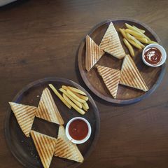 A picture of Cheese sandwich with tangy chilli sauce:.