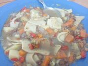 Una foto de lasaña de verduras
