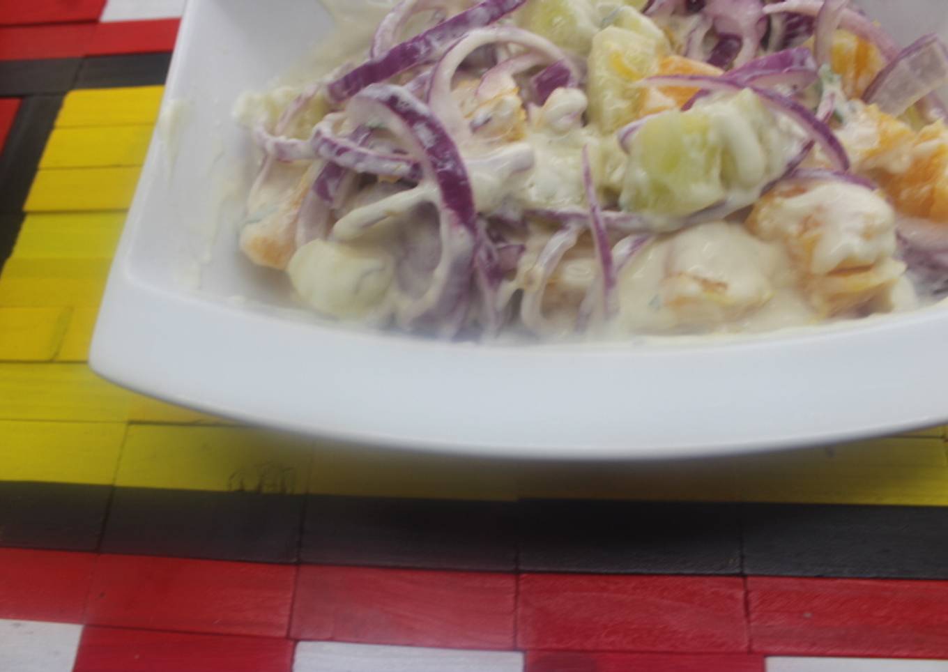 Ensalada tártara de naranja, cebolla y pepino