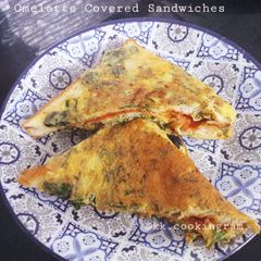 A picture of My loaded Coriander Omelette Covered Sandwiches.