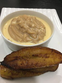 A picture of Brown pap and fried plantain.