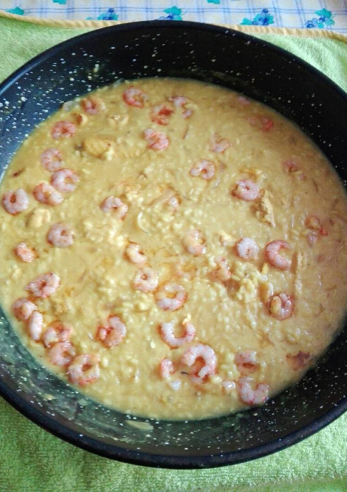 Una foto de Risotto de pollo y gambas