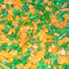 A picture of French beans with carrot veges.