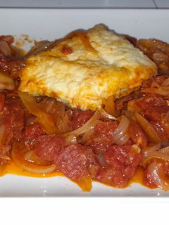 Una foto de Bacalao rebozado, con tomate natural (Sin sal)