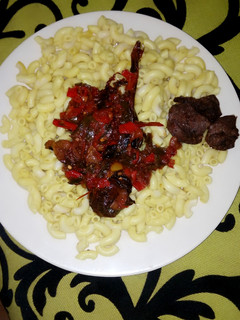 A picture of Yello macaroni with dry cat fish sauce.