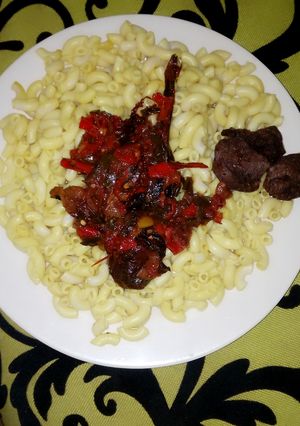A picture of Yello macaroni with dry cat fish sauce.