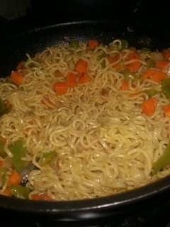 A picture of Noodles with Little Veggies.