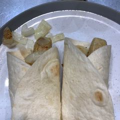 A picture of Sausage and onion wrap.
