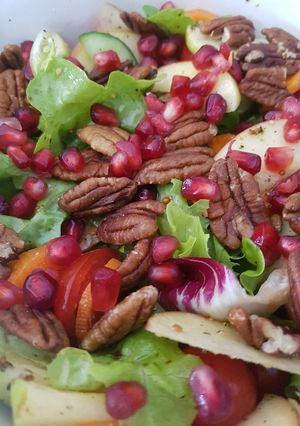 A picture of Pomegranate, Pecan, Apple salad.