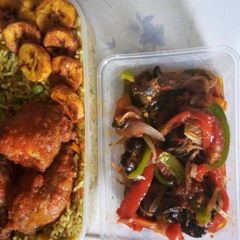 Fried rice with chicken and fried plantain A picture of Fried rice with chicken and fried plantain.