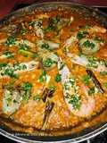 Arroz Maty, con alcachofas confitadas, ajos tiernos, gambas langostineras y sepia