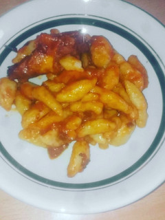 Una foto de Ñoquis de papas con salsa c/pollo(a elección)