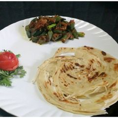 Lachha paratha with masala bhindi A picture of Lachha paratha with masala bhindi.