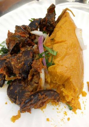 A picture of Moi moi with peppered snail.