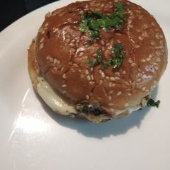 A picture of Tandoori jalapeno veggies cheese burgers.