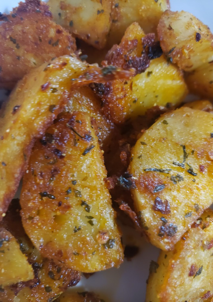 Una foto de Papas bravas al horno 🤤