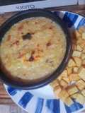 Chupe de zapallos italianos con papas fritas
