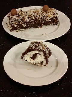 A picture of Chocolate Cake Roll With Coconut Cream Filling.