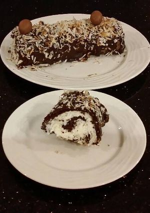 A picture of Chocolate Cake Roll With Coconut Cream Filling.