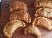 Una foto de empanadas peruana