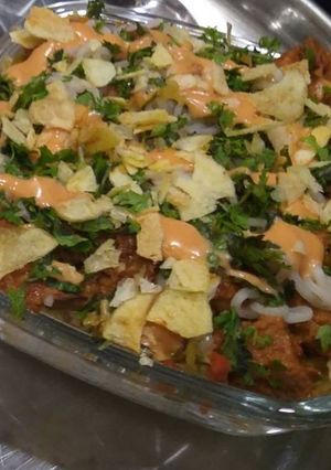 A picture of Chicken tikka masala layered rice.