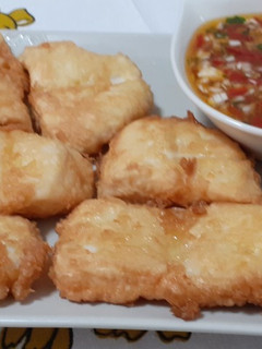 Una foto de Medallones de merluza, y salsa vinagreta
