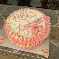 A picture of Cake and butter icing decoration.