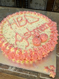 A picture of Cake and butter icing decoration.