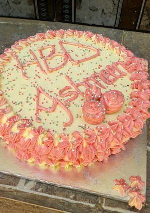 A picture of Cake and butter icing decoration.