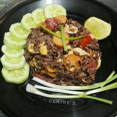 A picture of Thai Style Fried Rice with Egg and Sausages.