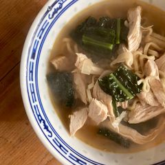 A picture of Poached chicken and ginger broth.