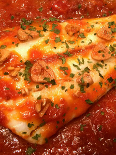 Una foto de Bacalao con pisto al horno