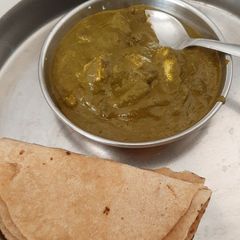 A picture of Palak paneer.