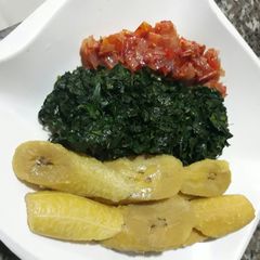 A picture of Boiled ripe plantain with vegetable and tomatoes sauce.