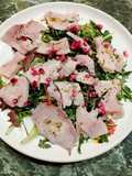 Swordfish Carpaccio with Arugula and Pomegranate Seeds